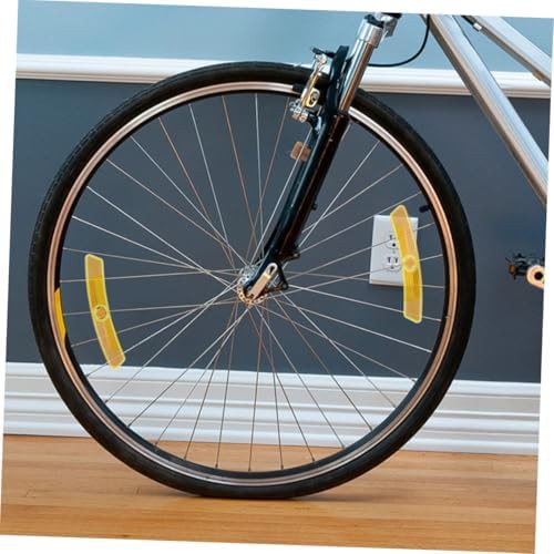 Yellow plastic bicycle spoke reflectors — photo 5